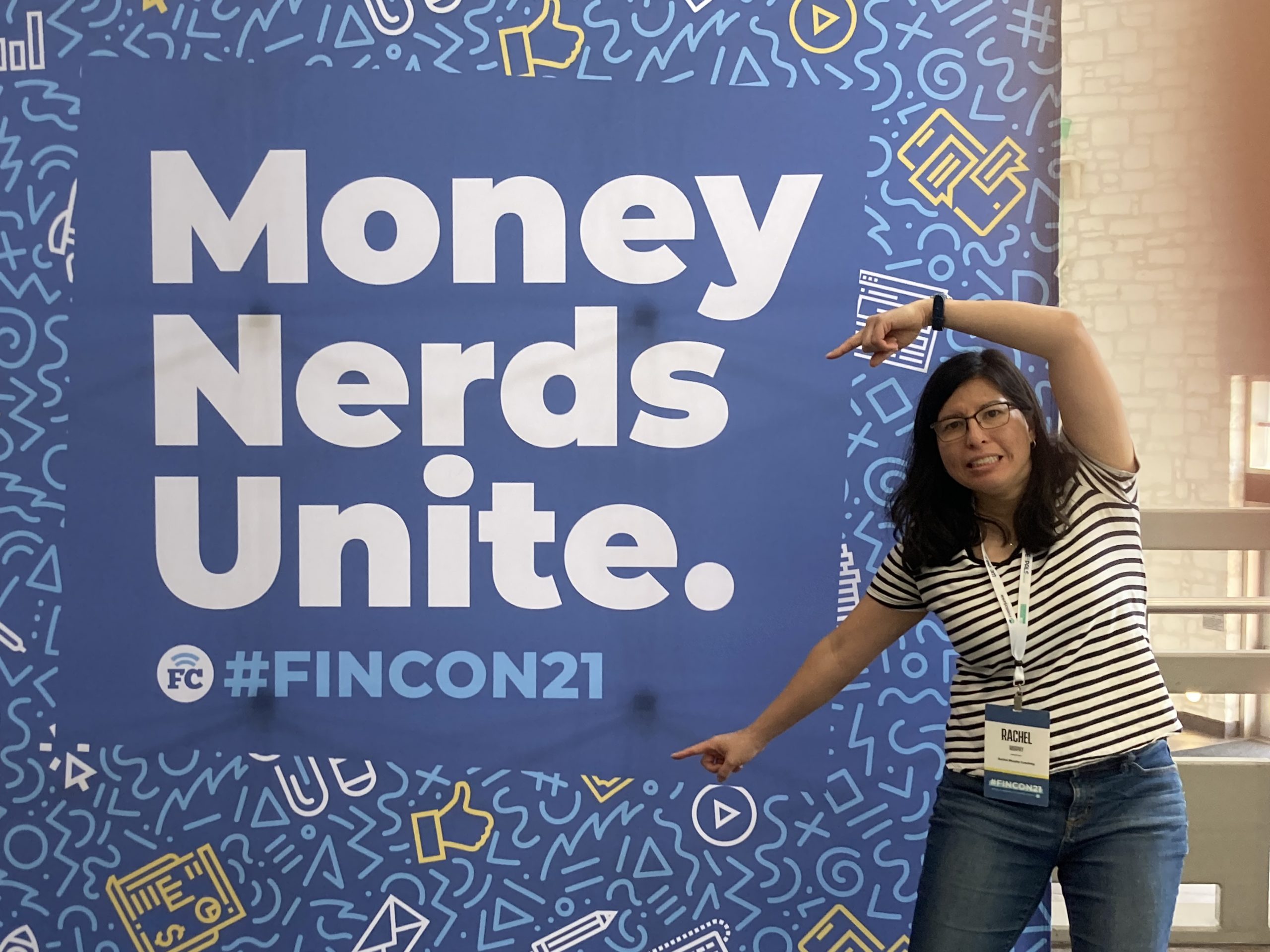 Rachel in front of the FinCon sign